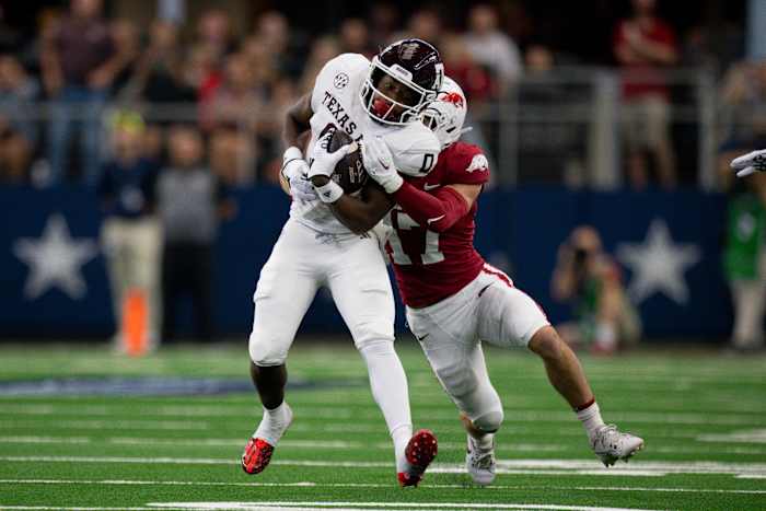 A&M Aggies wide receiver Ainias Smith (0) in action during the game between the Texas A&M Aggies and the Arkansas Razorbacks at AT&T Stadium.